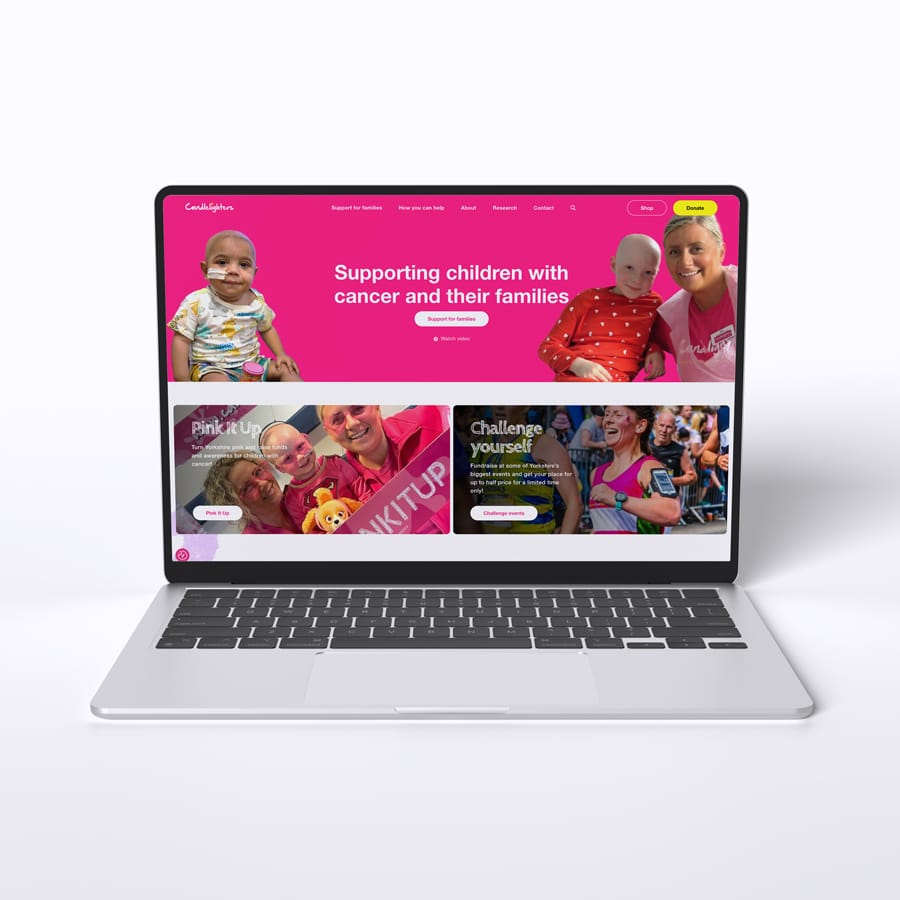 Candlelighters website home page displayed on laptop.
