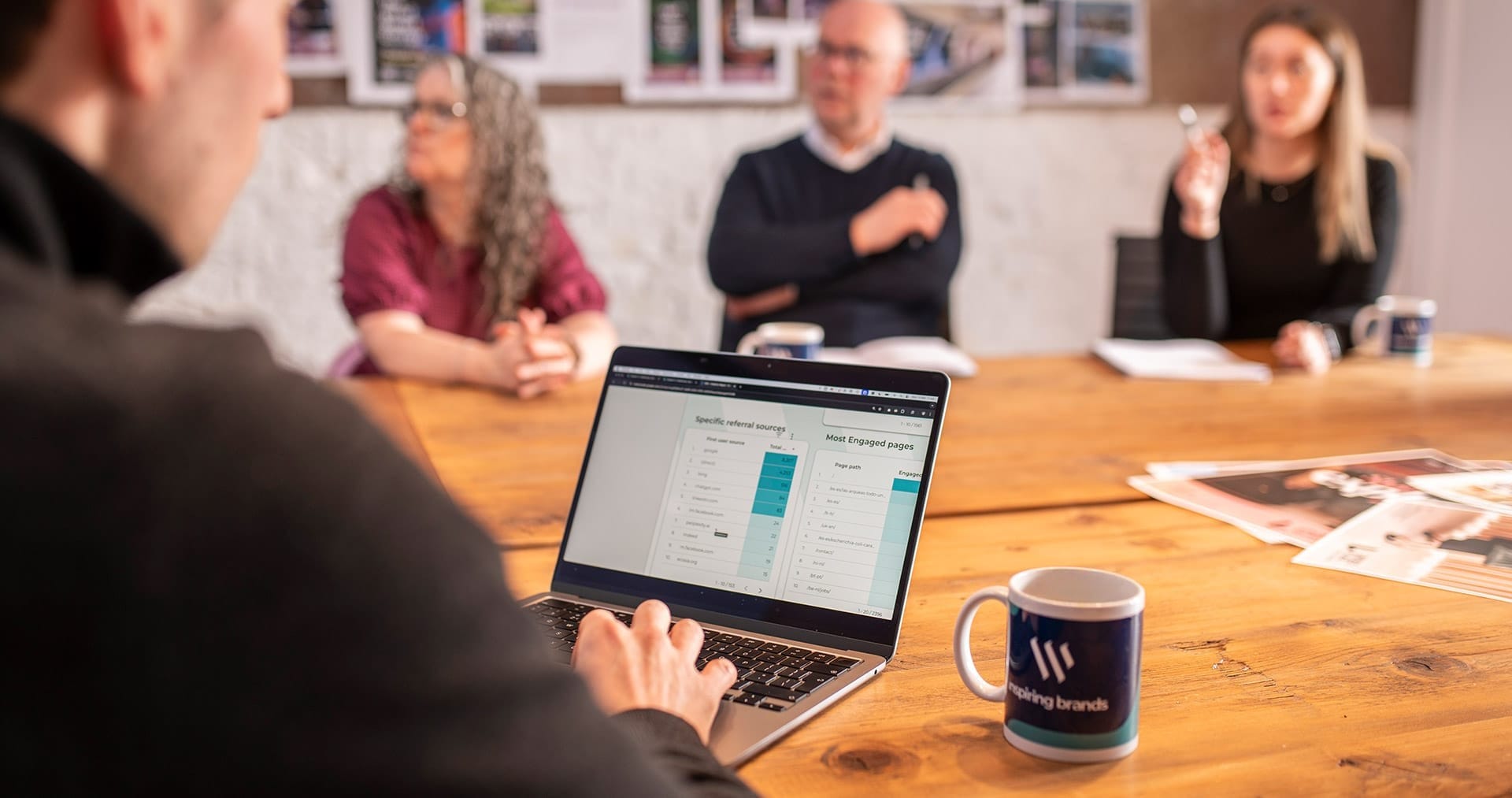 Wish agency team in the board room.